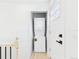 Convenient laundry closet with stacked washer and dryer unit, maximizing space at 3150 S Pennsylvania Street, Englewood, CO 80113