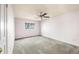 Spacious bedroom with carpet floors and ceiling fan at 814 Glenwood Dr, Lafayette, CO 80026
