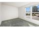 Bedroom offers a large window allowing plenty of natural light at 814 Glenwood Dr, Lafayette, CO 80026