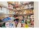 Walk-in pantry providing ample storage space with organized shelving for kitchen essentials at 4814 Monarch Dr, Firestone, CO 80504