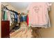 Spacious walk-in closet with clothing racks and storage options for organization at 4814 Monarch Dr, Firestone, CO 80504