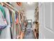 Large walk-in closet with shelving and a workspace at 3164 S Wheeling Way # 306, Aurora, CO 80014