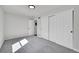 Comfortable bedroom featuring carpet flooring and closet at 6485 S Havana St # A, Englewood, CO 80111