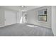 Cozy bedroom with carpet flooring, bright windows, and ample closet space at 6485 S Havana St # A, Englewood, CO 80111
