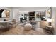 This is a living room with comfortable seating, fireplace, and a modern design at 6485 S Havana St # A, Englewood, CO 80111