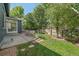 A well-maintained backyard with a patio and dining set, perfect for outdoor relaxation and entertainment at 10610 Winterflower Way, Parker, CO 80134
