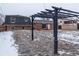 View of the backyard with a pergola at 10902 Bannock St, Northglenn, CO 80234