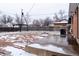 Large backyard with a patio area, pergola, and plenty of space for outdoor activities at 10902 Bannock St, Northglenn, CO 80234
