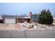 Charming brick home with a well-manicured front yard and attached garage at 10902 Bannock St, Northglenn, CO 80234