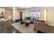 Inviting living room with hardwood floors, natural light, and comfortable seating at 10902 Bannock St, Northglenn, CO 80234