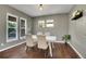 Bright dining room with hardwood floors and an abundance of natural light at 14200 Lakeview Ln, Broomfield, CO 80023