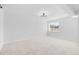 Finished basement with neutral carpet, recessed lighting, and a window at 127 Emerald St, Broomfield, CO 80020