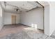 Clean, empty garage with white walls, ready for a new owner's personal touch at 127 Emerald St, Broomfield, CO 80020