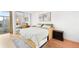 Cozy bedroom with a queen bed, ample storage, and closet with mirrored doors at 1313 N Williams St # 1003, Denver, CO 80218