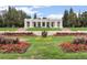 City Park features a neoclassical pavilion, flower beds, and walking paths at 1313 N Williams St # 1003, Denver, CO 80218