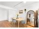 Dining room featuring a table, seating for four, and stylish decor at 1313 N Williams St # 1003, Denver, CO 80218