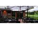 Charming outdoor patio area with tables, chairs, and umbrellas for shaded seating at Secret Garden in Denver at 1313 N Williams St # 1003, Denver, CO 80218