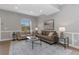 Bright living room with comfortable seating, a large window, and modern decor at 2560 Champa St, Denver, CO 80205