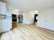 Modern kitchen with stainless steel appliances and plenty of cabinet space at 4623 S Lowell Blvd, Denver, CO 80236