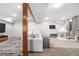 Bright basement featuring a cozy seating area, television and ' play area at 6275 Ponderosa Way, Parker, CO 80134