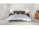 This spacious bedroom is complete with neutral colors and comfortable furnishings at 6275 Ponderosa Way, Parker, CO 80134