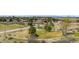 Elevated neighborhood view, showcasing meticulously landscaped common areas and pathways at 6275 Ponderosa Way, Parker, CO 80134