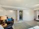 A basement area includes a seating area with a black leather couch at 6869 Quay St, Arvada, CO 80003