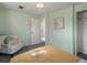 Bedroom featuring a chair with a pillow, view of open door at 6869 Quay St, Arvada, CO 80003