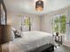 Bright bedroom with large windows, natural light, and minimalist decor at 6869 Quay St, Arvada, CO 80003