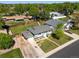 Charming single-Gathering home with a well-manicured lawn, lush landscaping, and a two-car garage at 6869 Quay St, Arvada, CO 80003