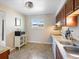 Efficient kitchen layout with ample countertop space and natural light at 6869 Quay St, Arvada, CO 80003