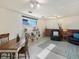Inviting living room with cozy seating, classic furnishings, and ample natural light at 6869 Quay St, Arvada, CO 80003