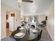 Open-concept living room and dining area provide ample space at 6869 Quay St, Arvada, CO 80003