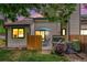 Cozy back patio with table and chairs surrounded by privacy fence and flowers at 8314 S Everett Way # B, Littleton, CO 80128