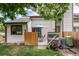 Cozy backyard patio featuring an umbrella table and seating area, perfect for relaxing outdoors at 8314 S Everett Way # B, Littleton, CO 80128