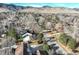 House nestled in a tree-lined neighborhood near mountains at 1620 Oak Ave, Boulder, CO 80304