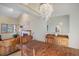 Bright dining room with a wooden table and unique light fixture at 1620 Oak Ave, Boulder, CO 80304