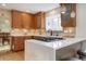 Modern kitchen with updated cabinets, quartz countertops, backsplash, and stainless steel gas range at 1620 Oak Ave, Boulder, CO 80304