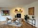 Cozy living room featuring a modern fireplace, stylish furniture, and unique decor at 1620 Oak Ave, Boulder, CO 80304