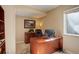 Comfortable office space with a large desk, executive chair, and natural light from a window at 1620 Oak Ave, Boulder, CO 80304