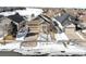 Ranch home with golf course views in a snow covered neighborhood at 8171 S Catawba Ct, Aurora, CO 80016