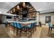 Community clubhouse bar with seating and liquor display at 8171 S Catawba Ct, Aurora, CO 80016