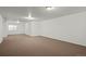 Large open basement area with new carpet at 8171 S Catawba Ct, Aurora, CO 80016
