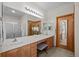 Double vanity bathroom with a large mirror and plenty of counter space at 8171 S Catawba Ct, Aurora, CO 80016