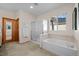 Bathroom features a shower and bathtub, perfect for relaxation at 8171 S Catawba Ct, Aurora, CO 80016