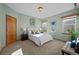 Bright and airy bedroom with a cozy sitting area at 8171 S Catawba Ct, Aurora, CO 80016