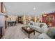 Open living room with a view into the kitchen and dining area at 8171 S Catawba Ct, Aurora, CO 80016