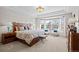 Spacious main bedroom with bay window and sitting area at 8171 S Catawba Ct, Aurora, CO 80016