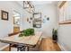 Dining area features a rustic table, modern lighting, and natural decor at 1640 Quince St, Denver, CO 80220