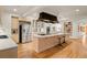 Gourmet kitchen featuring a large island, stainless steel appliances, and ample cabinet space at 28890 Pinewood Vista Dr, Evergreen, CO 80439